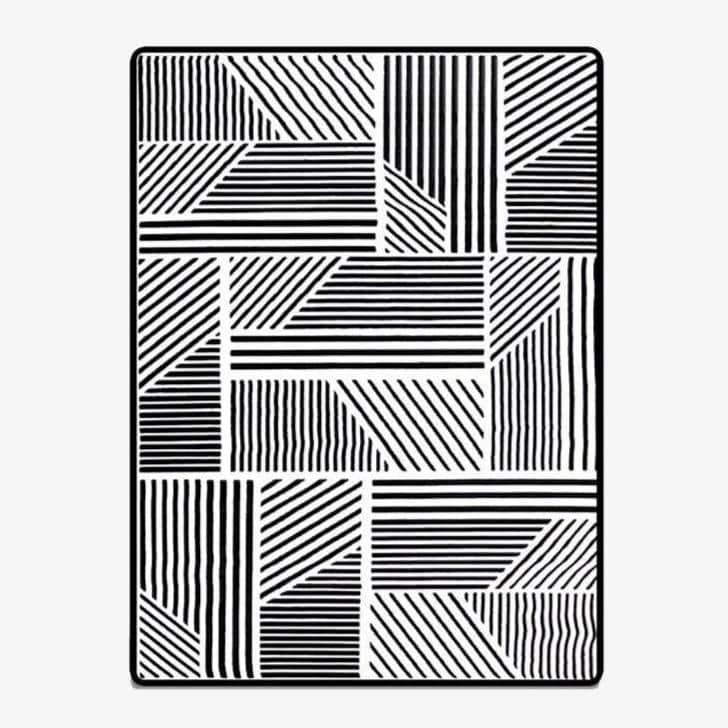 Alfombra moderna rectangular en blanco y negro de estilo geométrico
