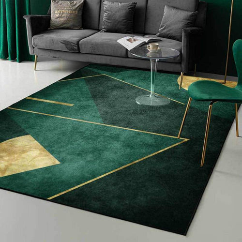 Rectangular carpet with green and gold geometric shapes
