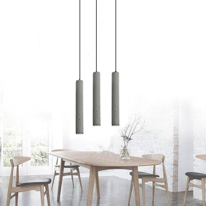 Suspension design LED allongée en ciment gris