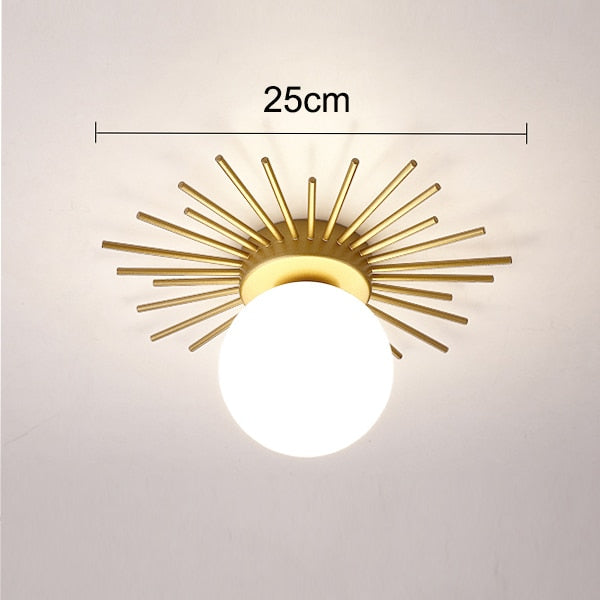 Plafonnier moderne LED avec soleil métallique et globe Sana