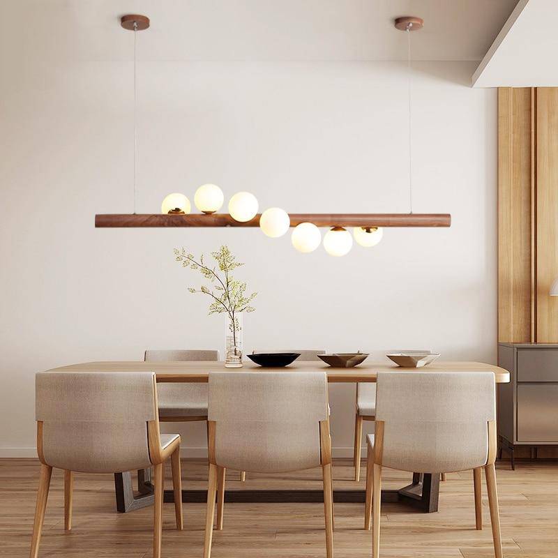 Wooden LED chandelier with several spheres in Scandinavian style