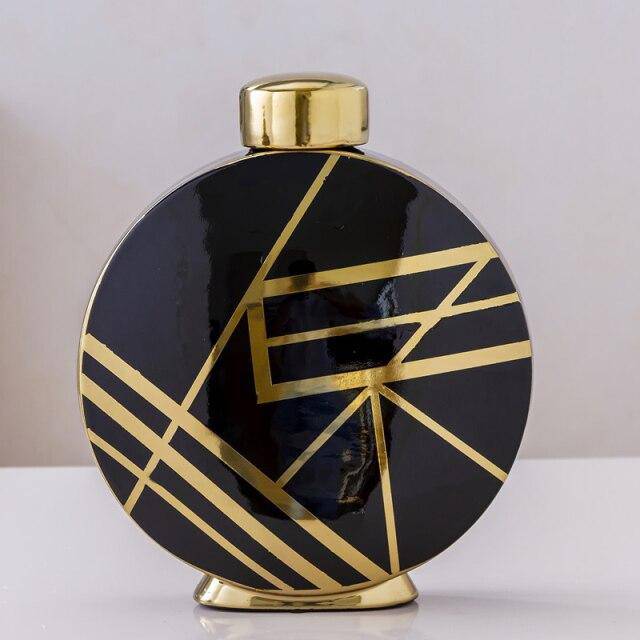 Jarrón design negro con motivos geométricos abstractos dorados Lujo