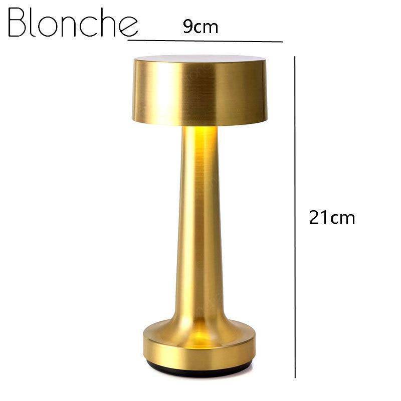 LED design table lamp in metal with rounded shapes