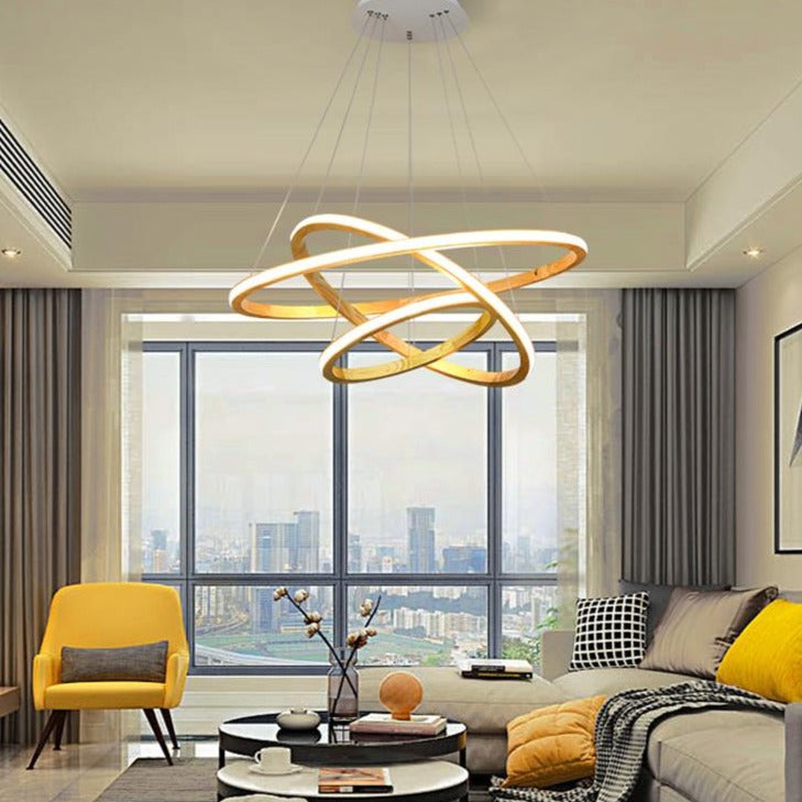 Modern LED chandelier with illuminated wooden ring Ibarne