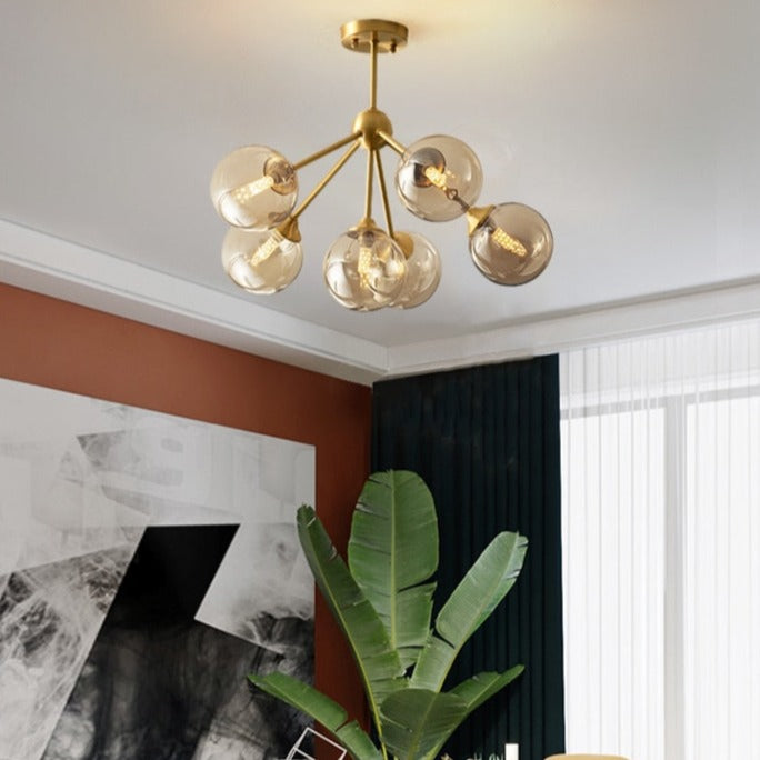 Modern LED chandelier with metal base and Yue glass globes