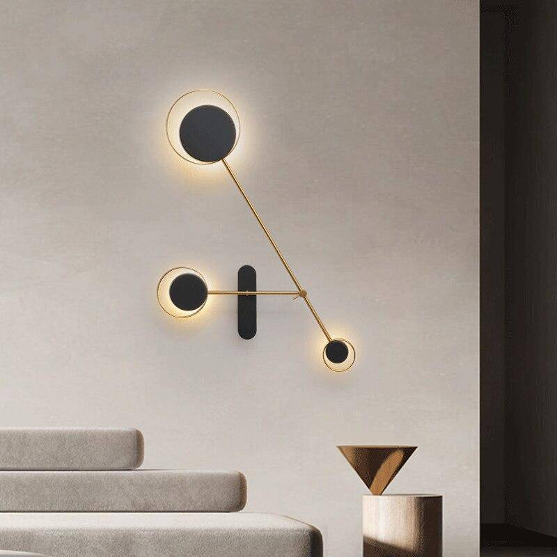 Applique murale design LED avec plusieurs disques noirs Loft