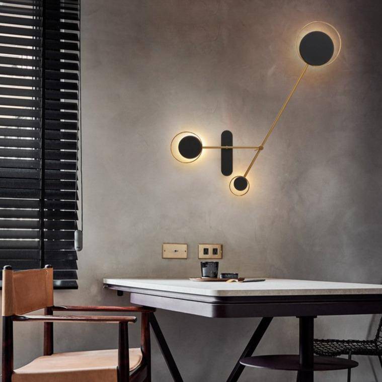 Applique murale design LED avec plusieurs disques noirs Loft