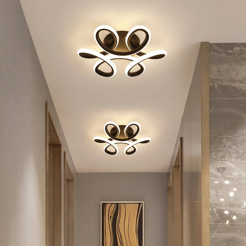 Moderna lámpara de techo LED con formas metálicas redondeadas Diena