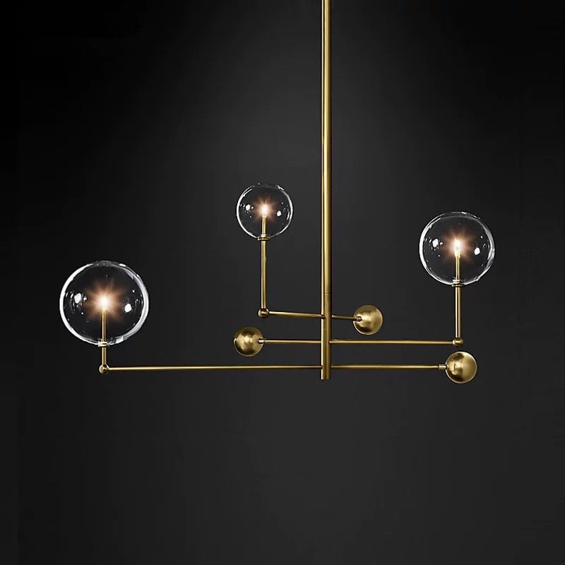 LED design chandelier with gold metal base and Zuri glass globes