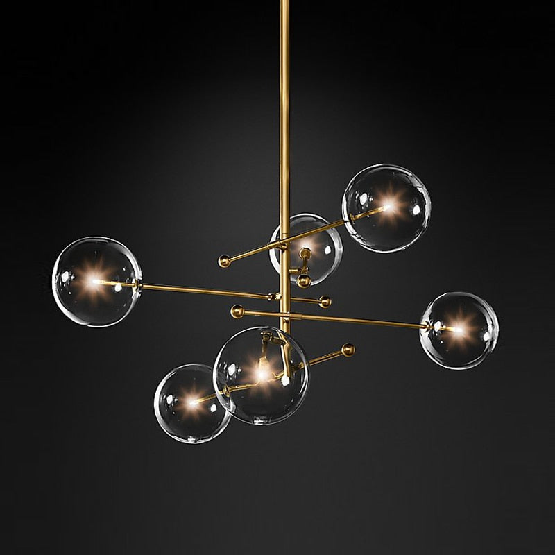 LED design chandelier with gold metal base and Zuri glass globes