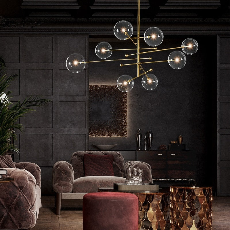 LED design chandelier with gold metal base and Zuri glass globes