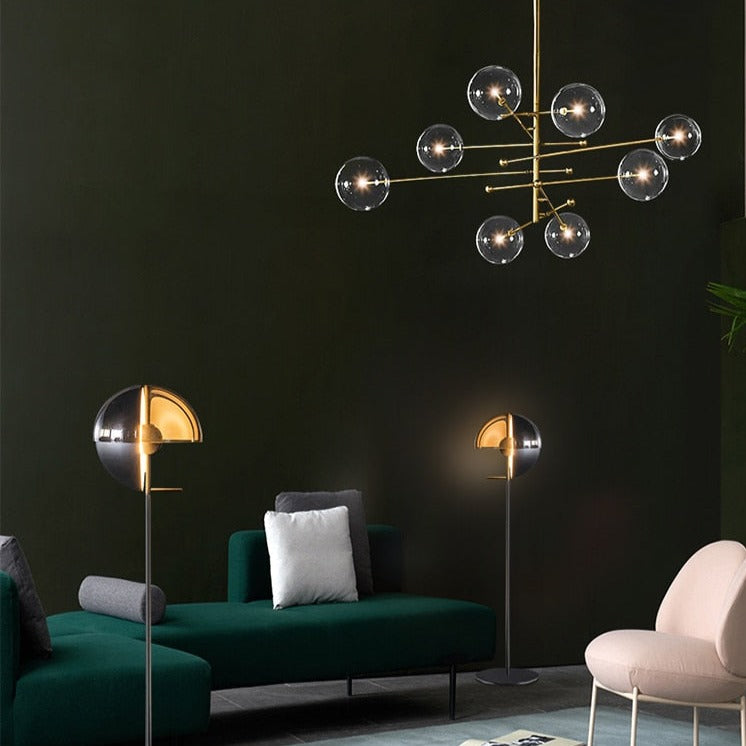 Araña design LED base metálica dorada y globos de cristal Zuri