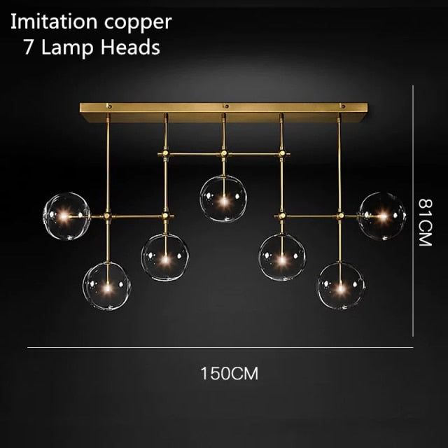 Araña design LED base metálica dorada y globos de cristal Zuri