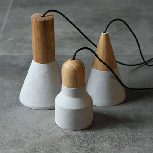 pendant light design in wood and cement of several forms Studio