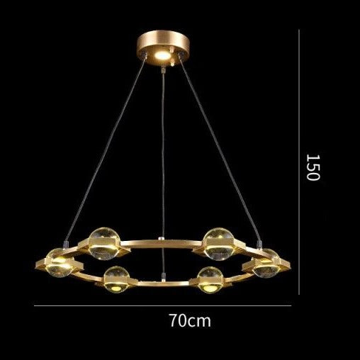 Lámpara circular moderna Pryccilia de cobre y cristal
