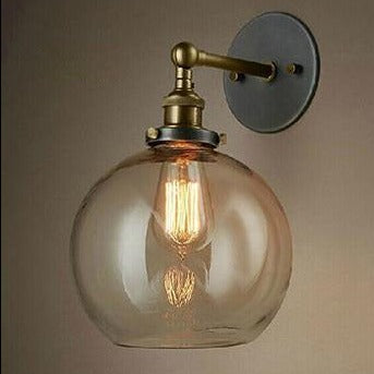 Lámpara de pared design con bola de cristal y metal dorado vintage