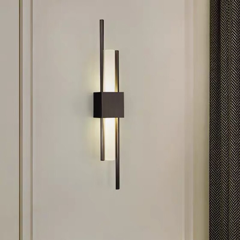 Lámpara de pared design LED con barra de metal dorada Xeres