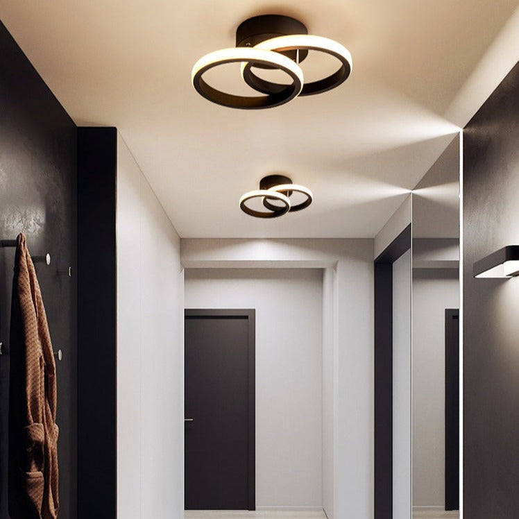 Modern LED ceiling light with crossed metal rings Dunkian