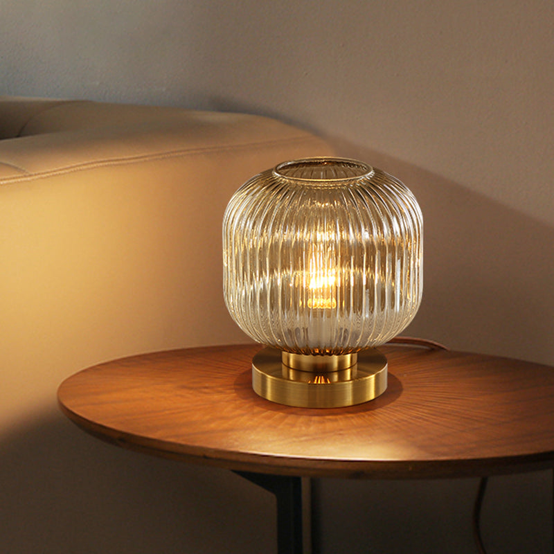 Cylindrical table lamp in coloured glass and gold base Quinn