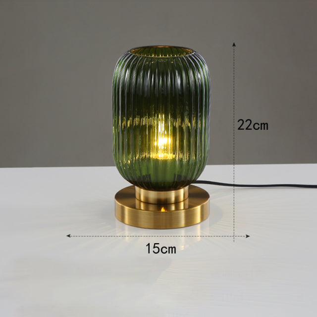 Lampe à poser cylindrique en verre coloré et base dorée Quinn