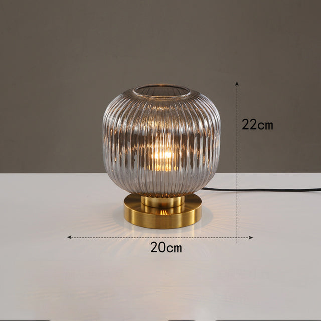 Cylindrical table lamp in coloured glass and gold base Quinn