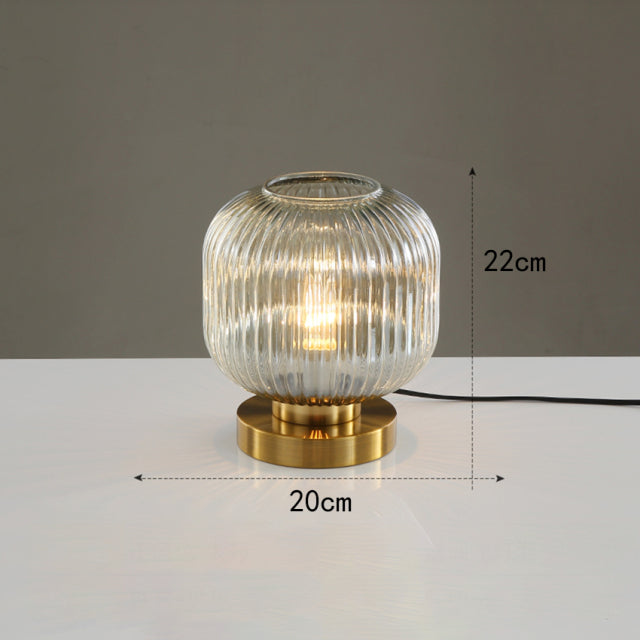 Cylindrical table lamp in coloured glass and gold base Quinn