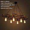 Suspension antique et rustique en forme de roue avec lampes apparantes