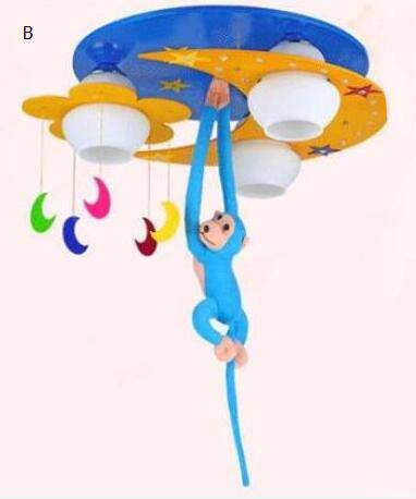 Plafonnier enfant avec singe suspendu (plusieurs couleurs)