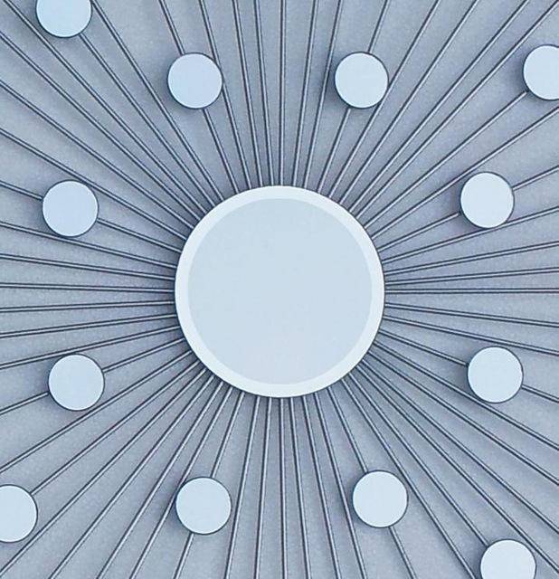 Round metal sunburst wall mirror Modern