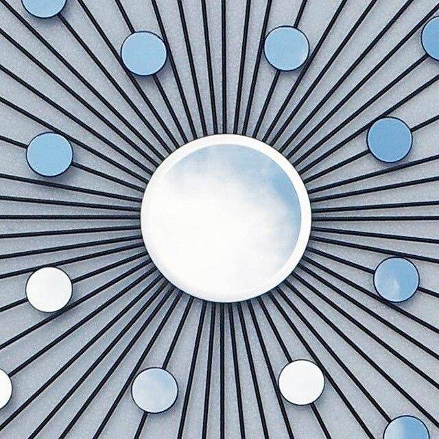 Round metal sunburst wall mirror Modern