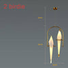 Suspension design LED oiseau dans cerceau doré