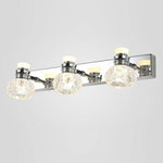Applique murale LED chromée avec plusieurs lampes en cristal