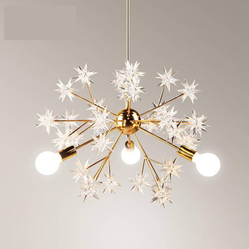 Gilded design chandelier with Loft stars
