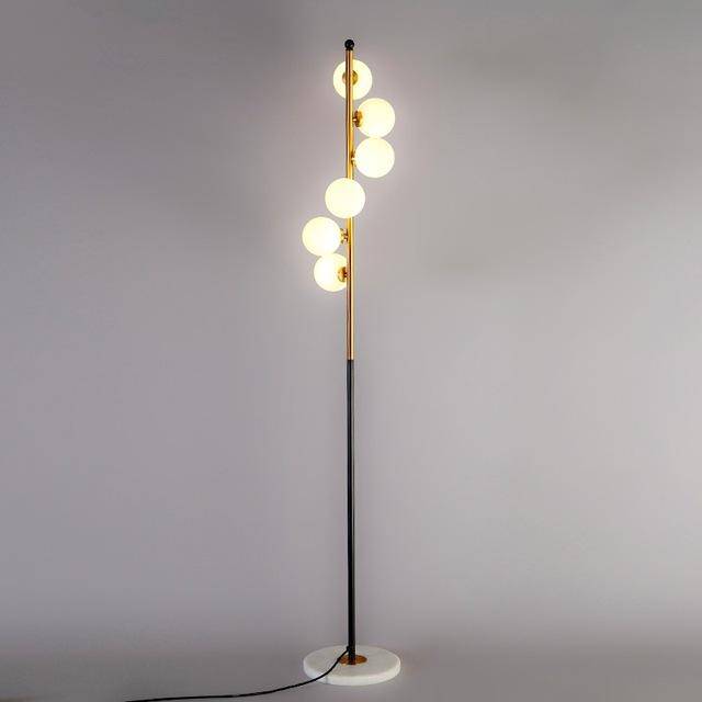Lampadaire design moderne LED doré à boule en verre