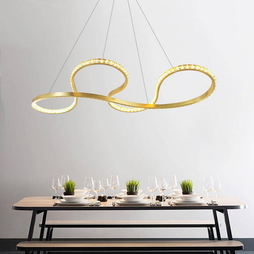 Lustre design arrondi à LED doré et cristal