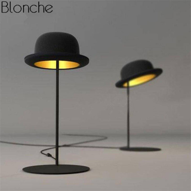 LED design table lamp with black bowler hat