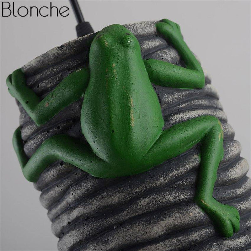 LED pendant light in cement with a frog Grenouille