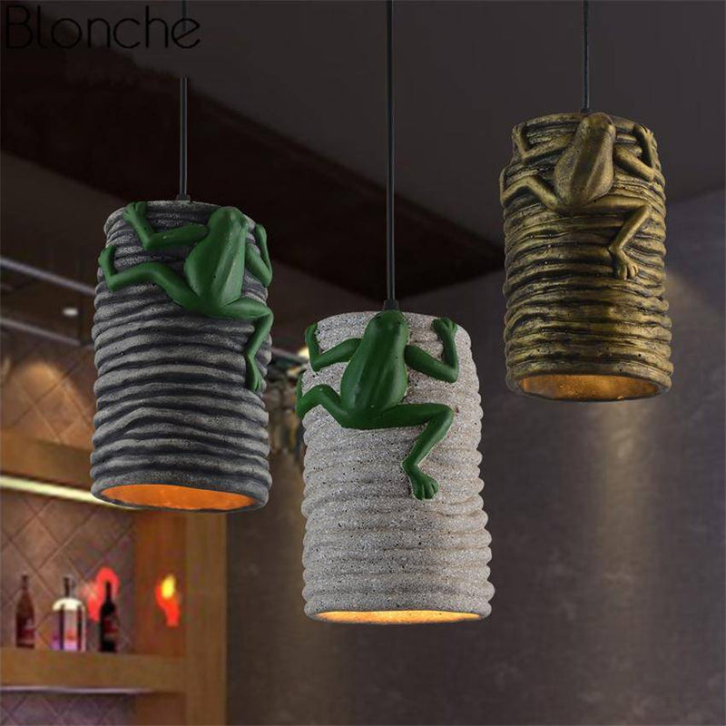 LED pendant light in cement with a frog Grenouille