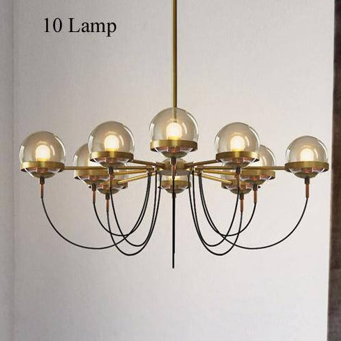 Lámpara de araña design oro industrial con bola de cristal