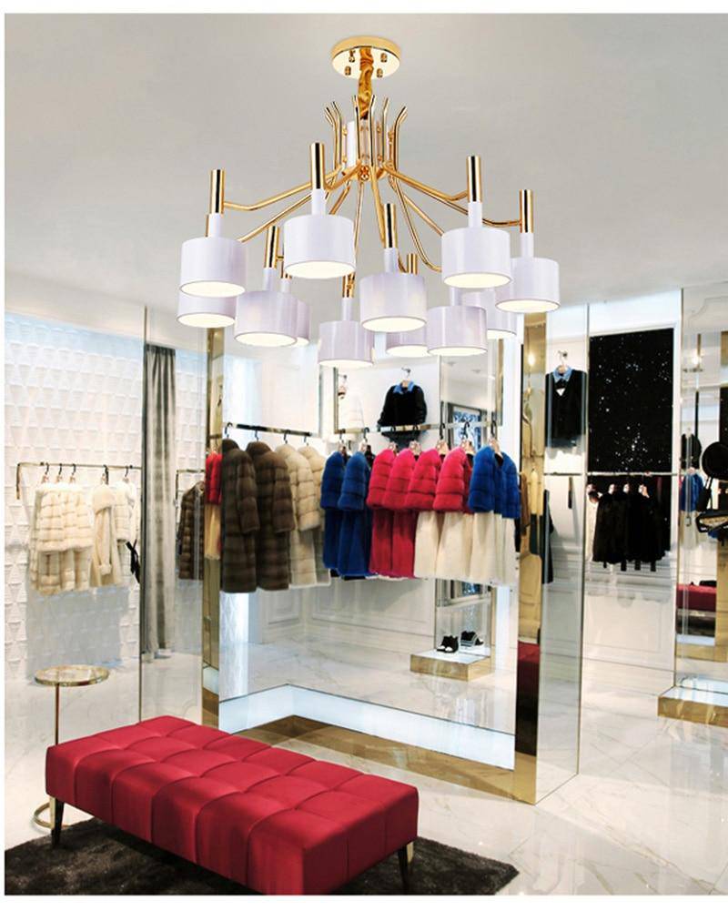 Golden LED design chandelier and black or white lamps Foyer