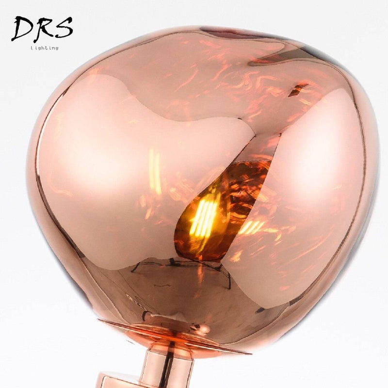 Lampe à poser design en PVC rose gold Melt