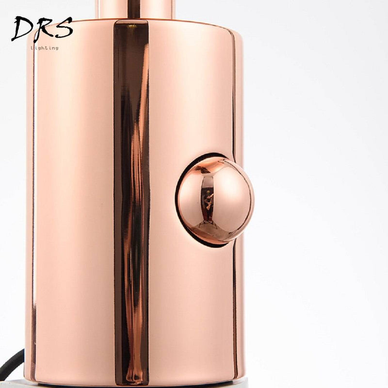 Lampe à poser design en PVC rose gold Melt