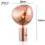 Lampe à poser design en PVC rose gold Melt