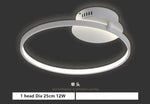 Plafonnier design en cercles blancs