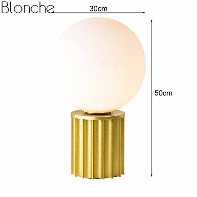 Design table lamp in gold metal with white LED ball