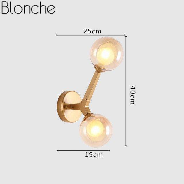 Aplique de pared design oro con bola de vidrio Sconce