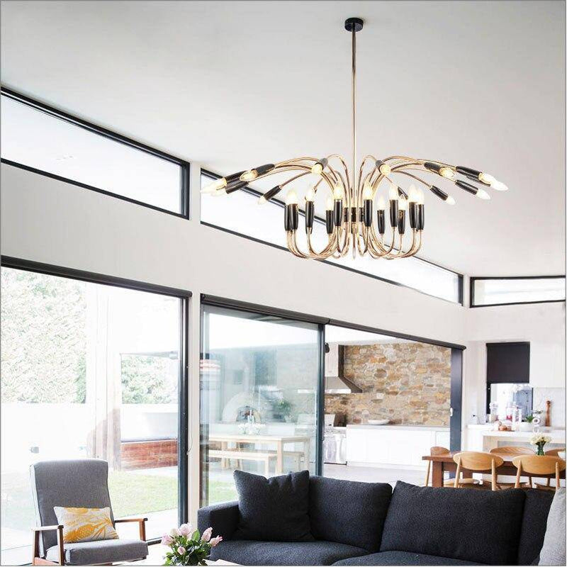 Design chandelier with rounded golden arm Head