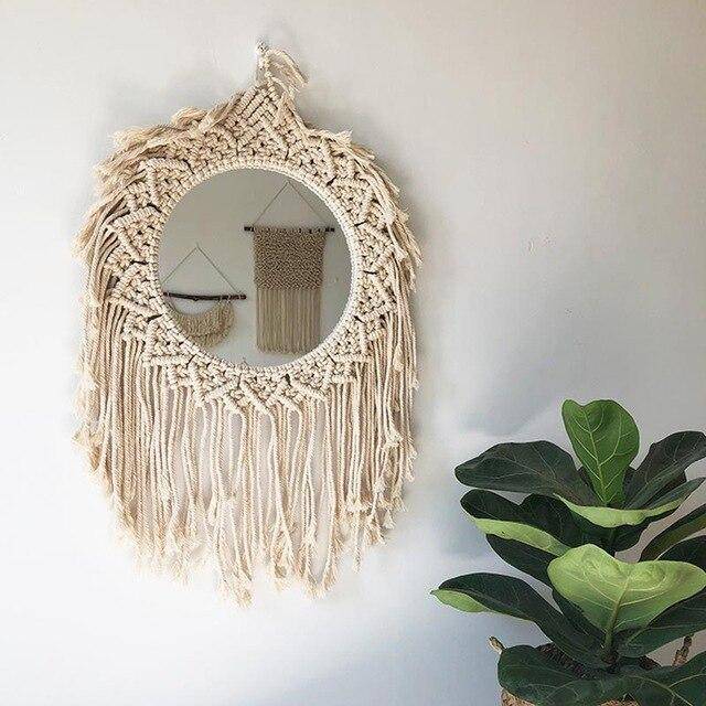 Round decorative wall mirror in drop cloth