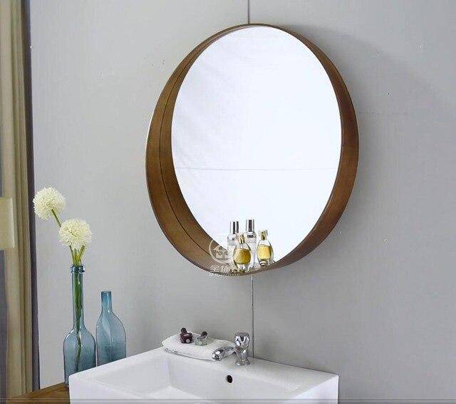 Espejo de pared redondo con borde metálico de color