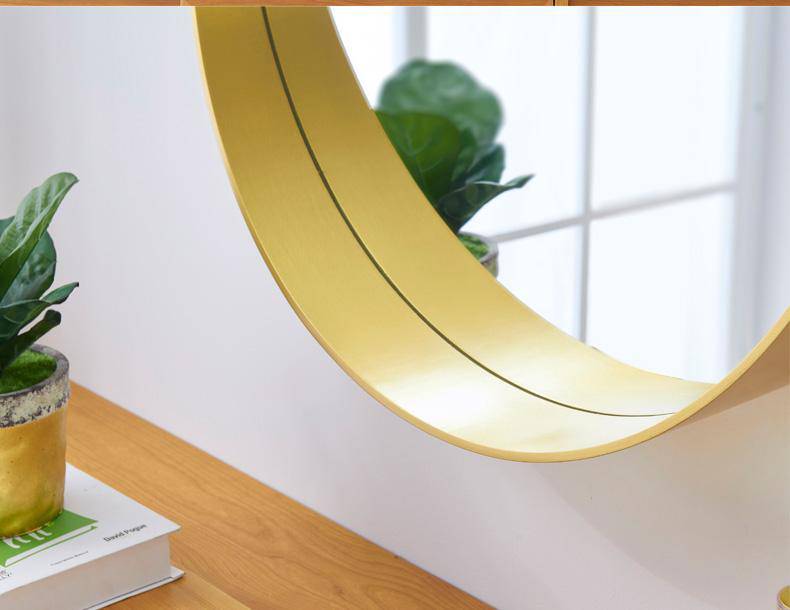Round wall mirror with coloured metal edge